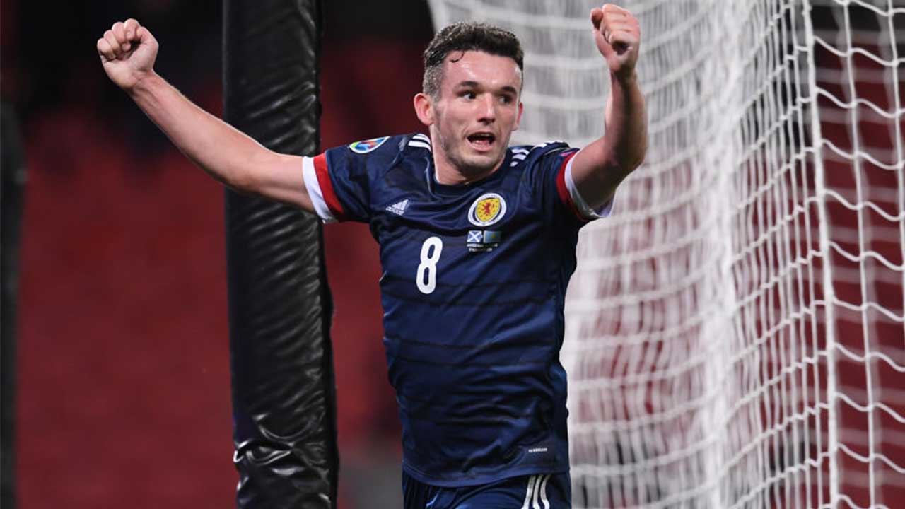 International report: McGinn double inspires Scotland win