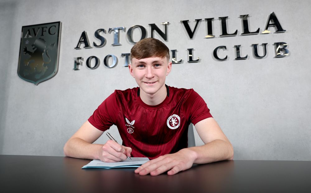 NW3B7855.jpg Calum Moreland signs his first professional contract with Aston Villa.