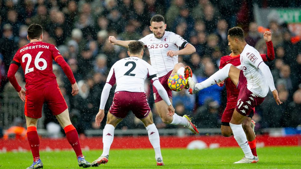 Aston Villa take on Liverpool at Anfield.